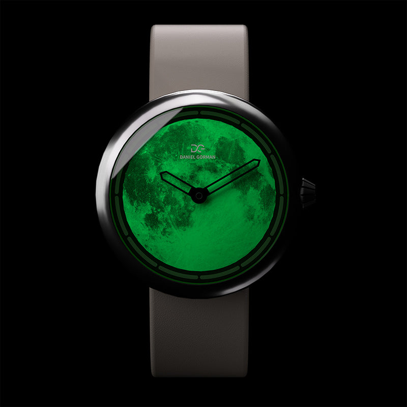 Daniel Gorman Moon white Cow Leather Strap watch glowing in the dark, highlighting luminous hands and futuristic space-inspired functionality.